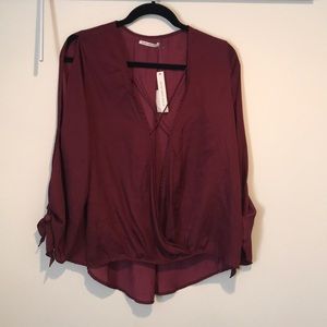 Maroon front cross cross top
